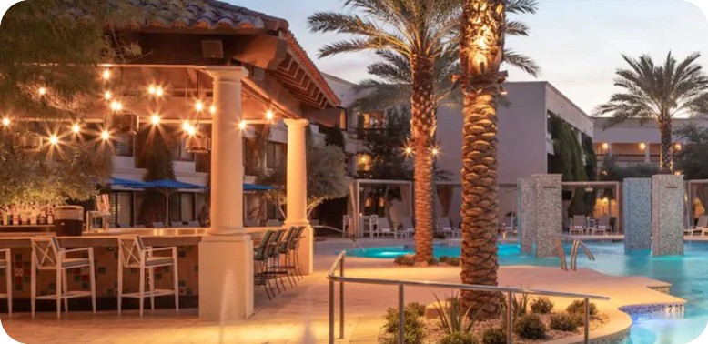 Poolside bar at The Scottsdale Resort & Spa at dusk.